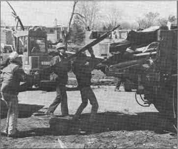 Disaster Assistance crew clear debris