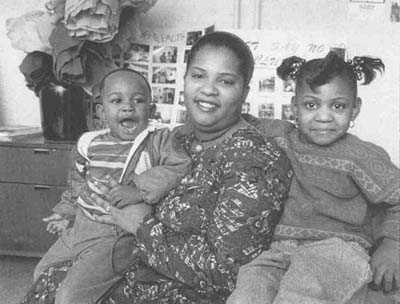 Michelle Hopkins, with son John and daughter April