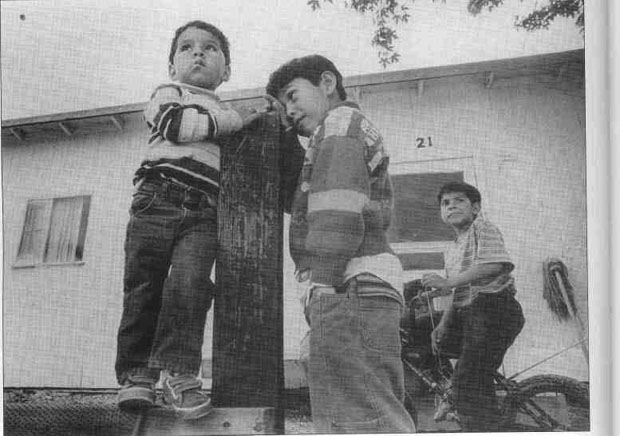 Young boys waiting for the bus