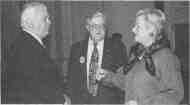 U.S. Conference of Mayors Executive Director Tom Cochran confers with Ken Alderson, Executive Director of the IML, and State Comptroller Loleta Didrickson