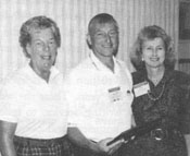 Ron Lehman receives NRPA's Great Lakes Board Member of the Year award from Great lakes choir, Phyllis Cossarek (left) Wilmette, Ill., and Fran Mainella (right), NRPA president and director of Florida State                    Parks. 