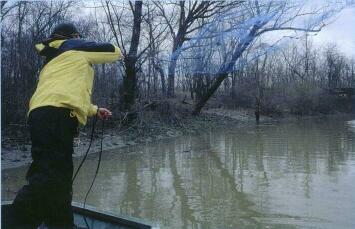 Rob Overby throws cast net